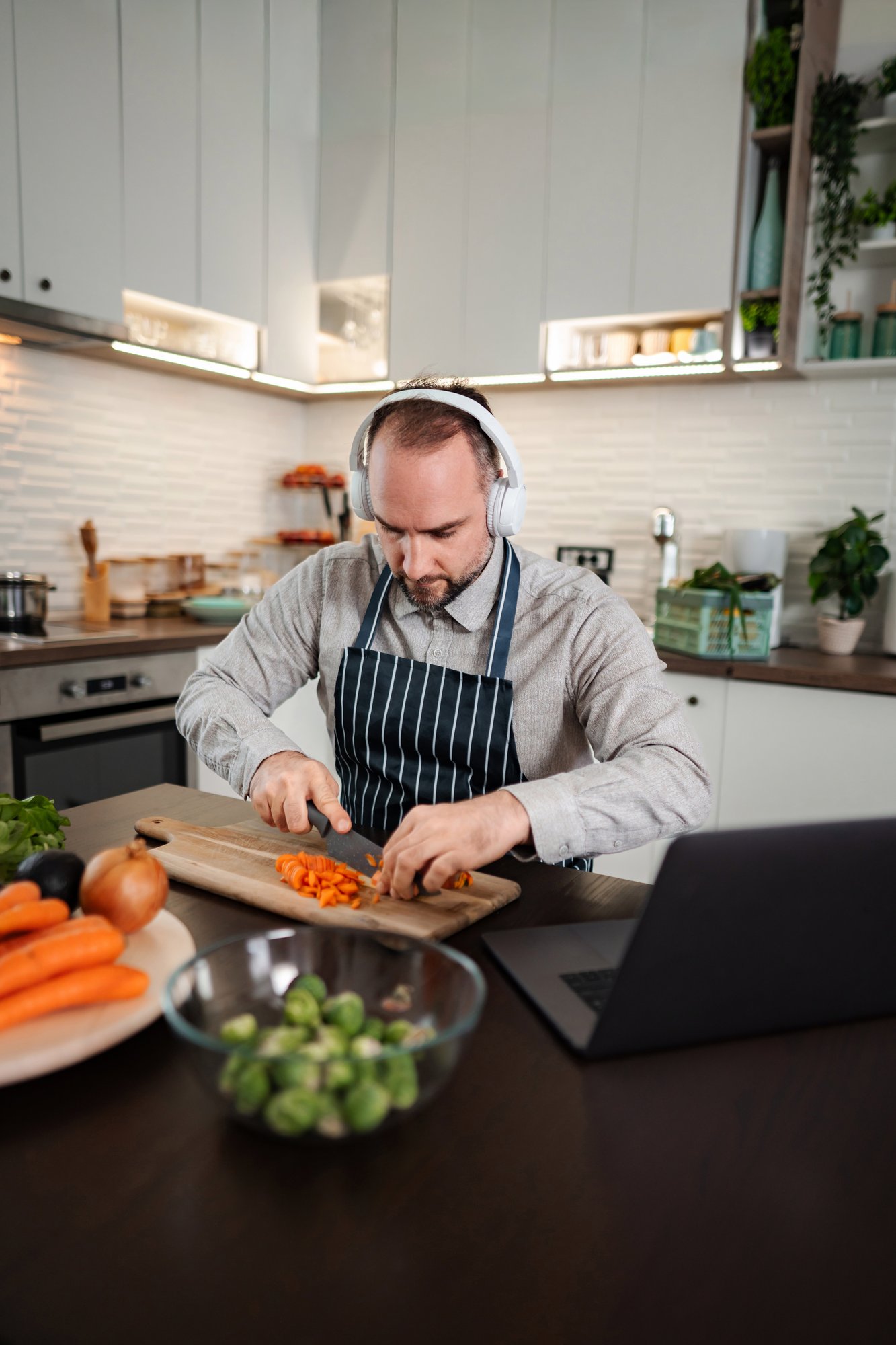 Chef teaching online with a kitchen setup